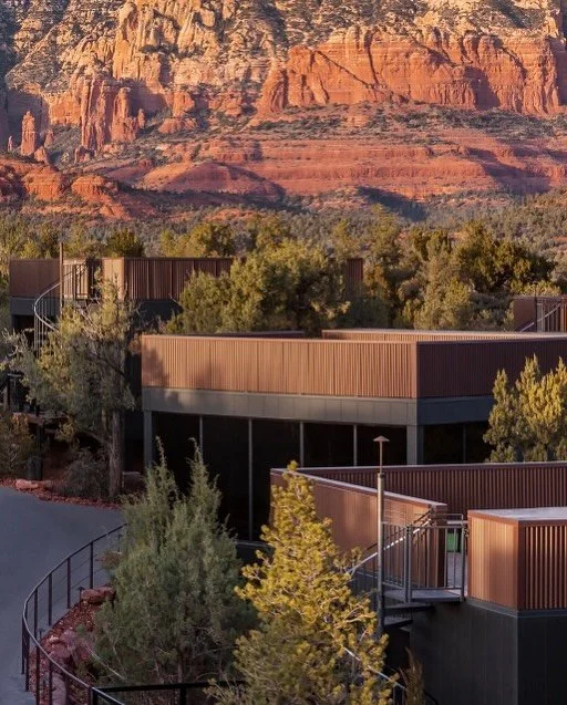 Designed to respect the ancient red rock geography of Sedona, Ambiente operates as North America&rsquo;s first purpose-built landscape hotel. The eco-conscious retreat features 40 elevated, glass-encased guest Atriums engineered on steel piers to lea