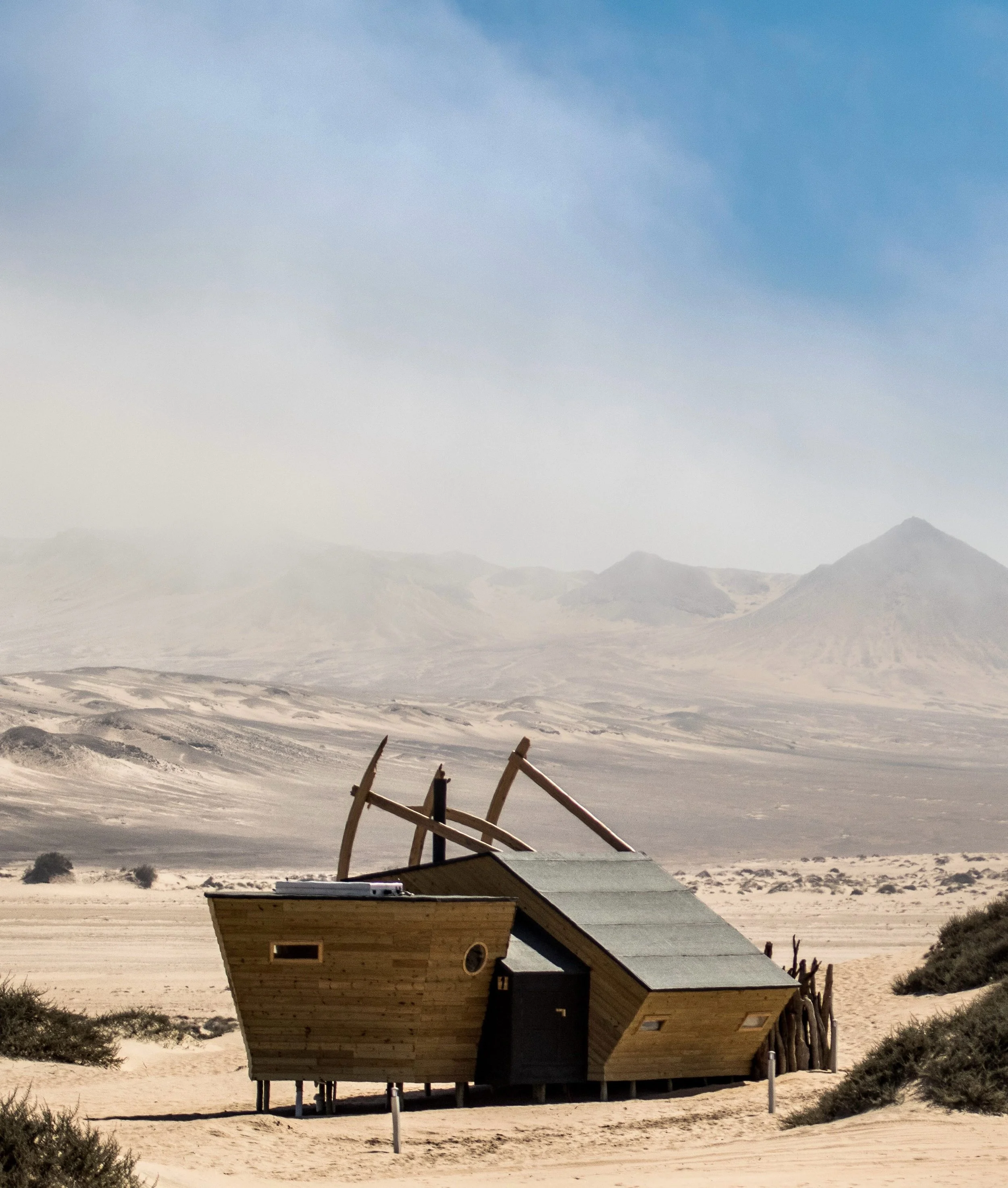 Set among the shifting sand dunes and windswept beaches of Namibia&rsquo;s remote Skeleton Coast, Shipwreck Lodge offers an immersive doorway into one of the most stark coastal wildernesses on Earth. The eco-conscious retreat features solar-powered c