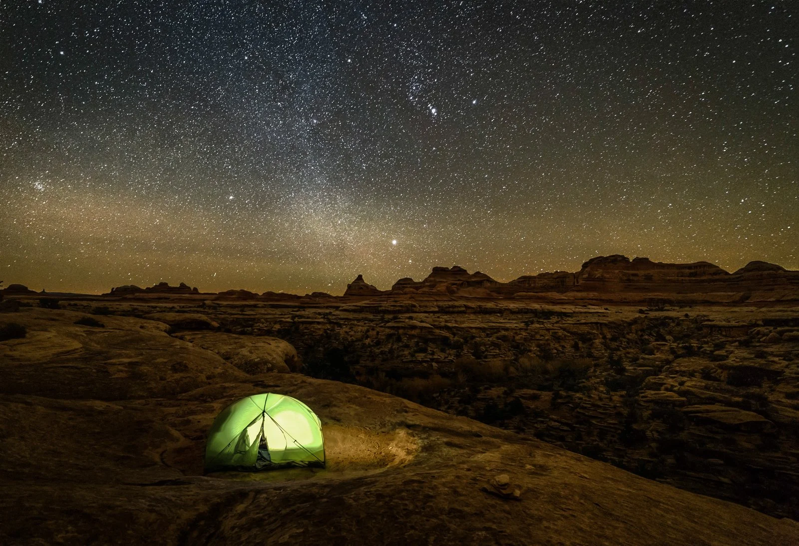WebSocial_CanyonLands_DarkSky-stock-photo-lonely-tent-in-canyonlands-(2)-94188365-full.jpg