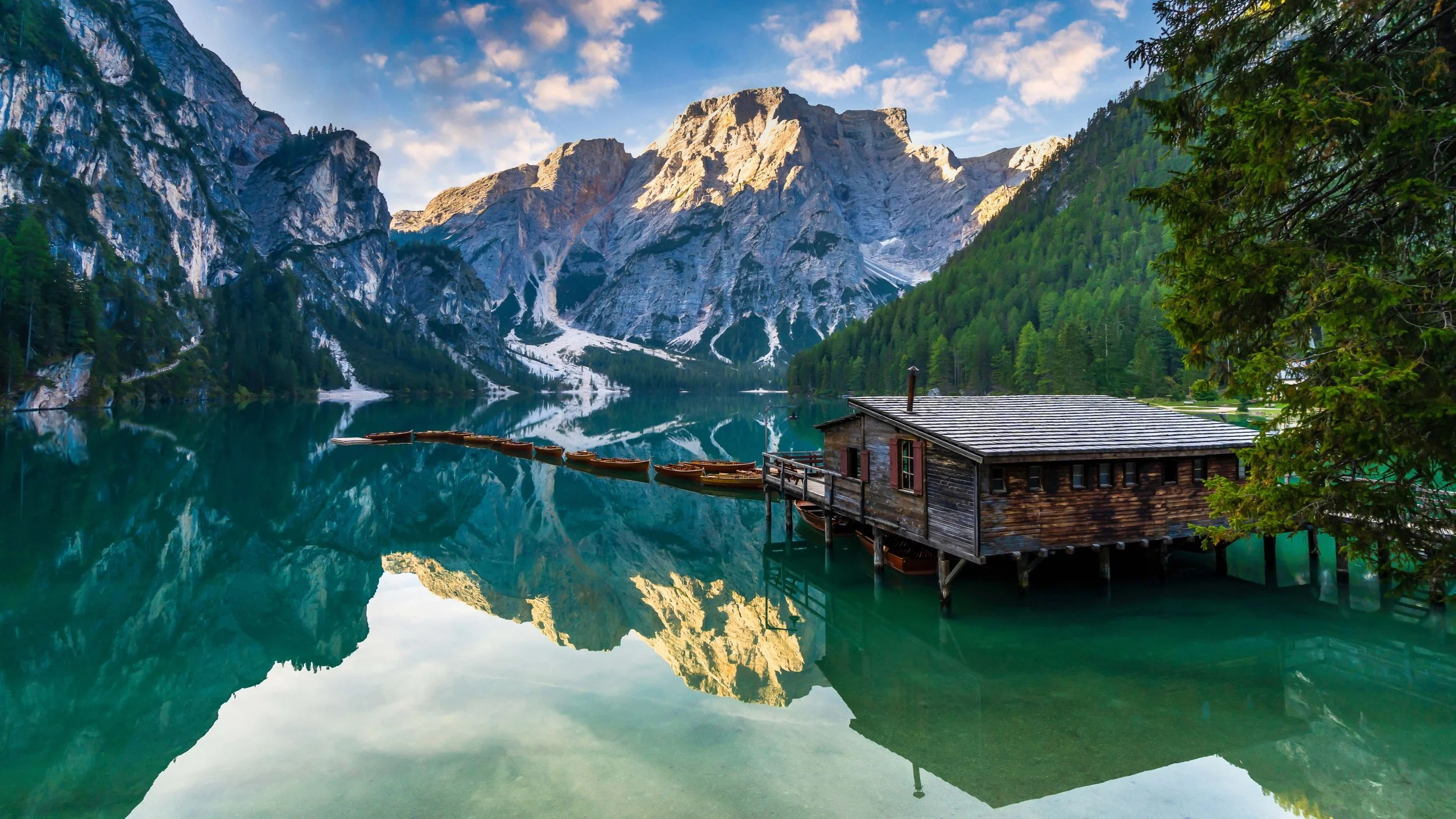 wellness travel | self care | spa hotel | mindfulness | Eco travel | eco hotel | landscape hotel | nature hotel | nature destination | room and wild | Lago di Braies, Italy