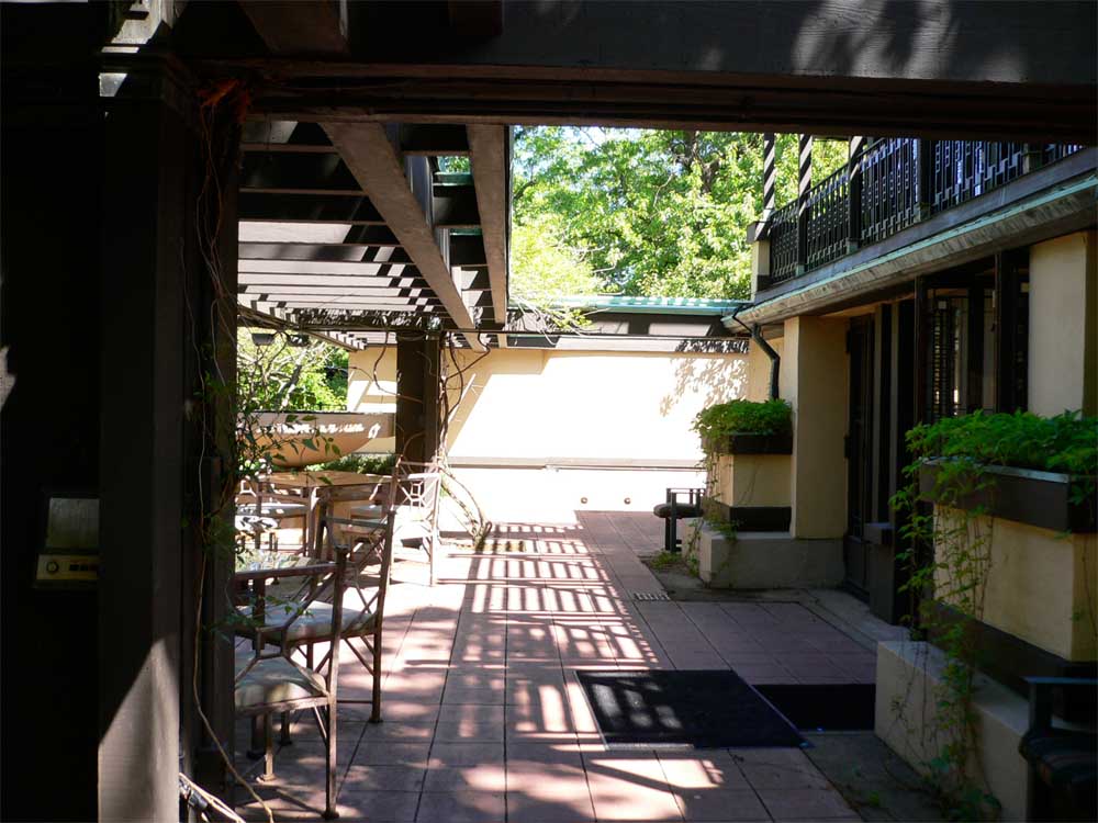 The terrace at the main house overlooks the lily pond.