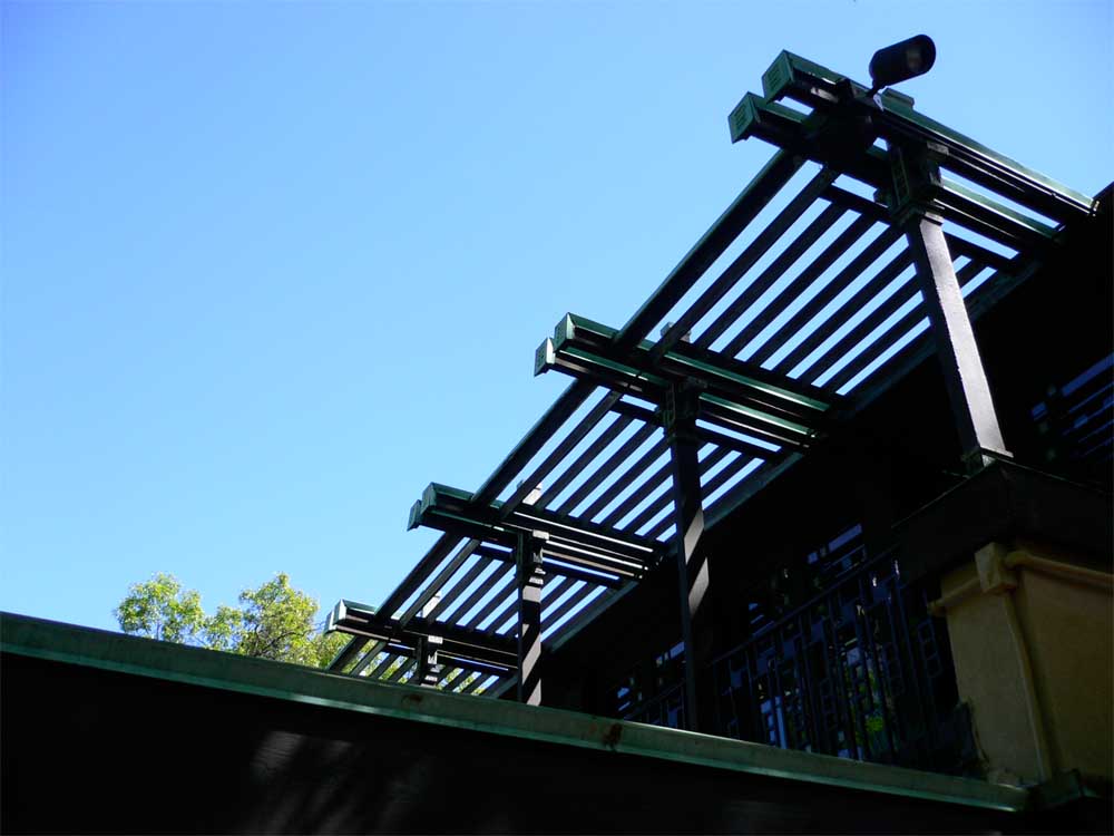 Exquisitely detailed trellis structure above the main living level.
