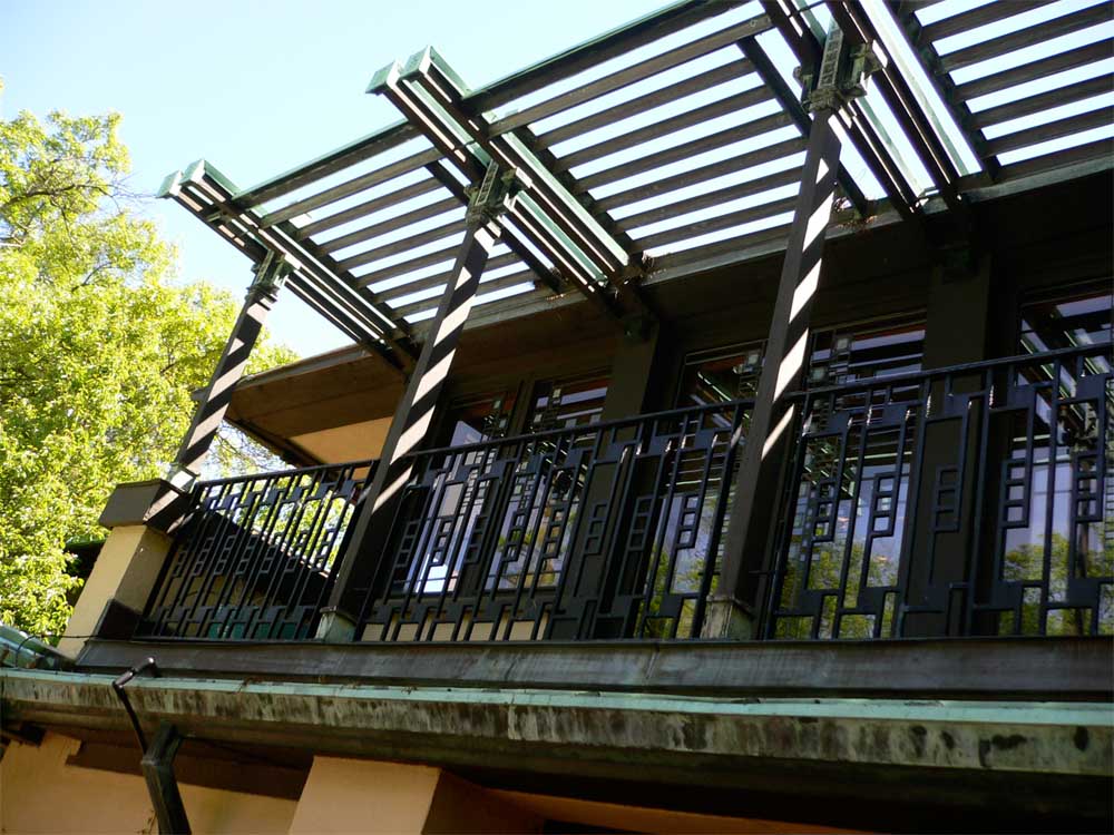 The upper trellis sits above the terrace outside the main living room. One of Wright's innovations in this house was to raise the living areas above the ground level, exploiting the views out to the wider landscape.