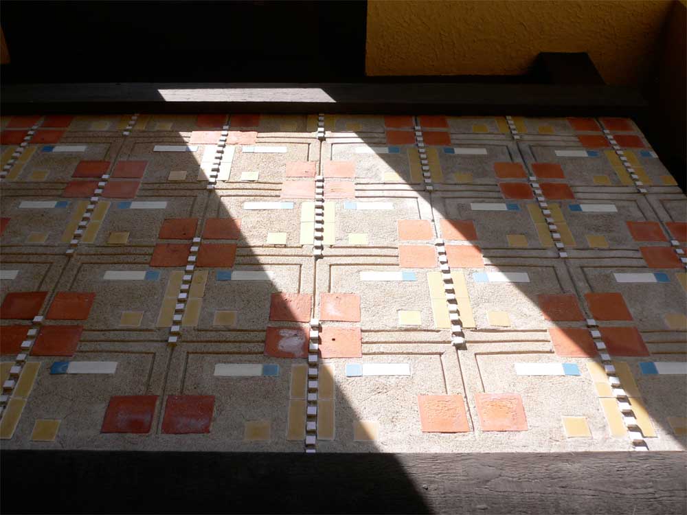 The wonderful textured mural at the entry to the house.
