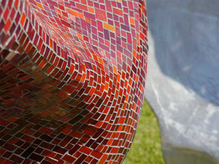  The skill of great mosaic work: transforming hundreds of tiny pieces of sharp cut glass into a sensuous smooth curve.    