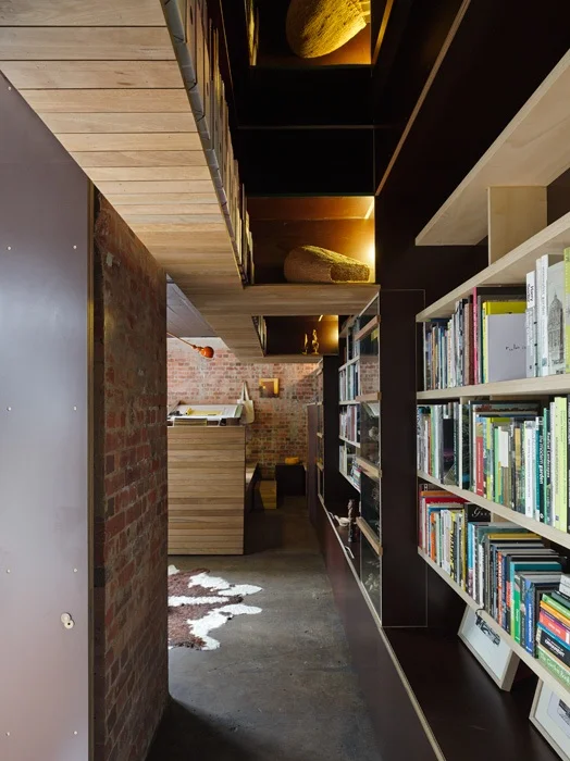 Just inside the entry, with the compressed ceiling above.