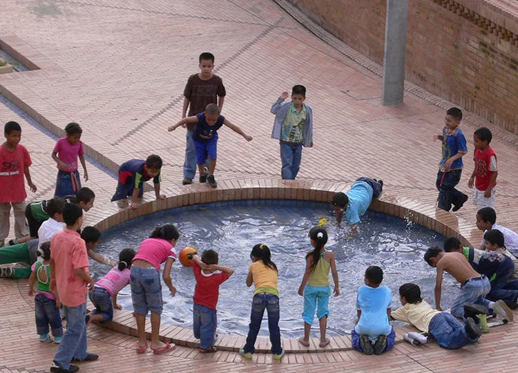 Children playing outside the new Moravia Community Centre, Medellin.