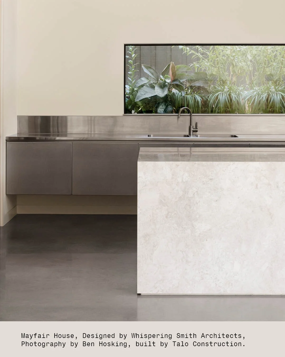 The plan runs long, with courtyards stitched in along the way.

Every room gets a garden view&mdash;low concrete plinths framing greenery, keeping the eye grounded. The kitchen&rsquo;s all stainless steel and stone: tough, practical, no drama.

Mayfa