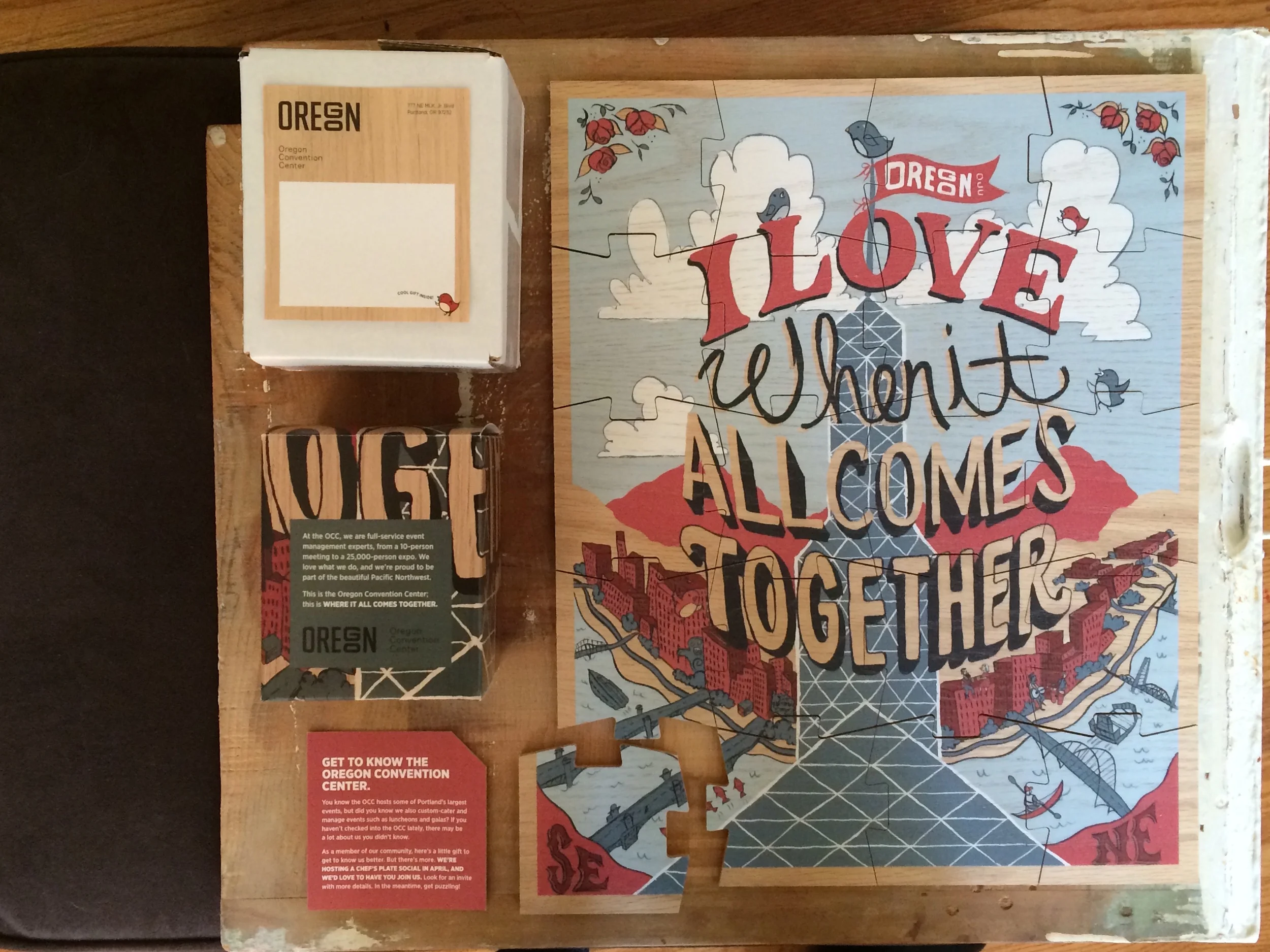 shipping label, puzzle box with messaging, invite insert, and full puzzle; where it all comes together.