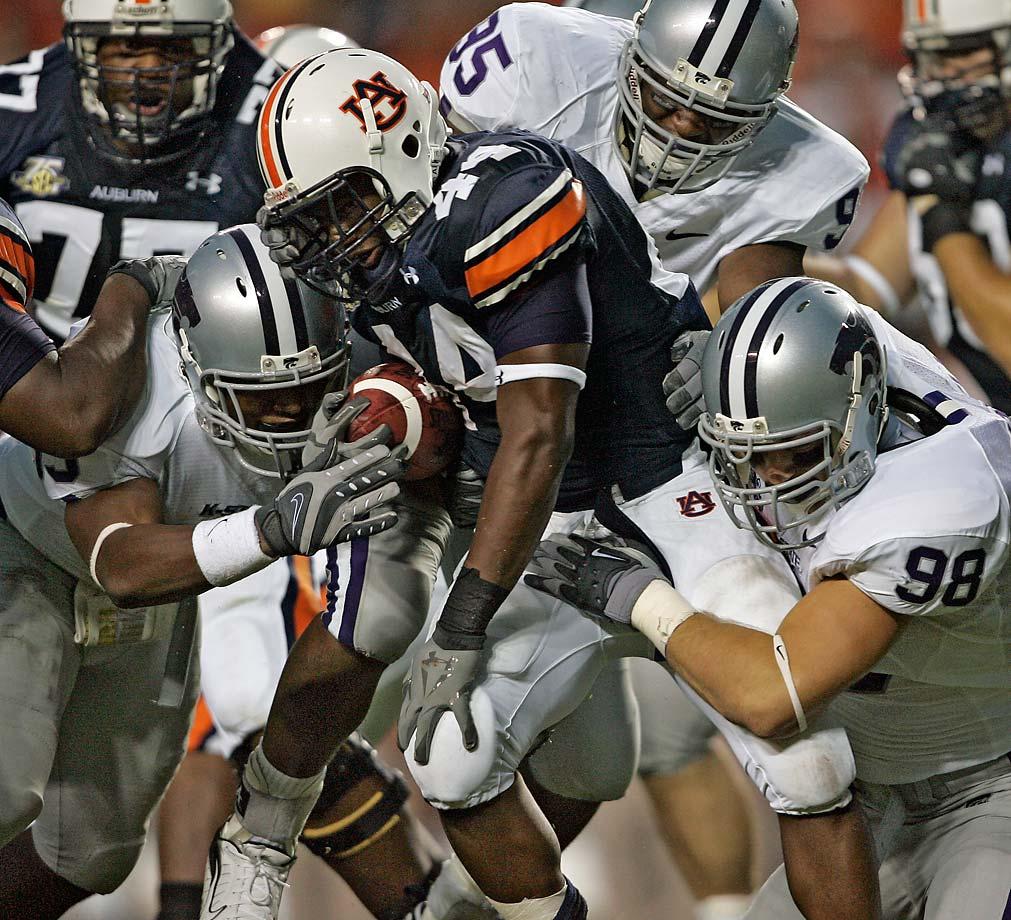 SEC vs. BIG 12, Gus Malzahn vs. Bill Synder. This will not be an easy game for the Tigers on a hostile Thursday night. (Jim Barcus/Kansas City Star/MCT/ Getty Images)