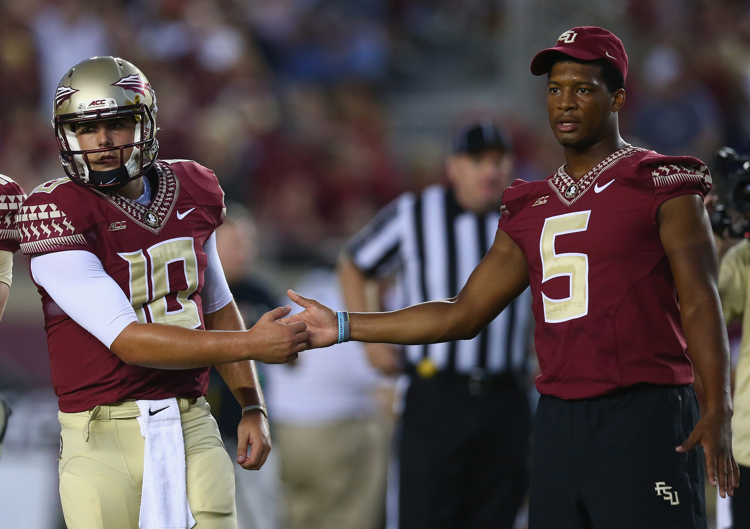 Without Jameis on the field, the Seminoles found themselves in deep trouble against Clemson, but his presence and support on the sideline was still valuable. (Ronald Martinez/Getty Images)