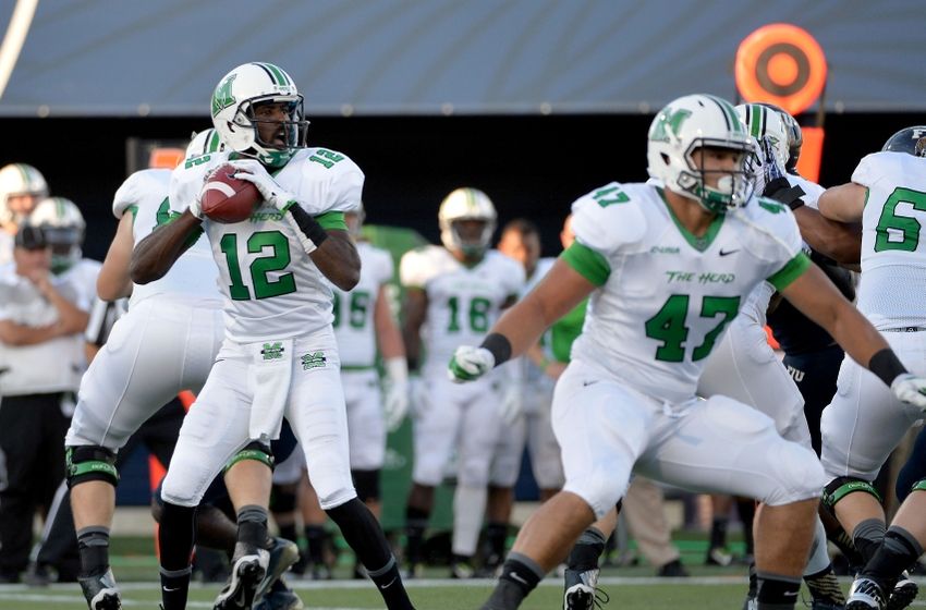 Rakeem Cato set a new NCAA record against Florida International, throwing a touchdown pass in 39 straight games. The senior out of Miami has 25 total TDs on the season, leading the Thundering Herd to a 7-0 record. If you ever get a chance, check him out. (AP Photo)