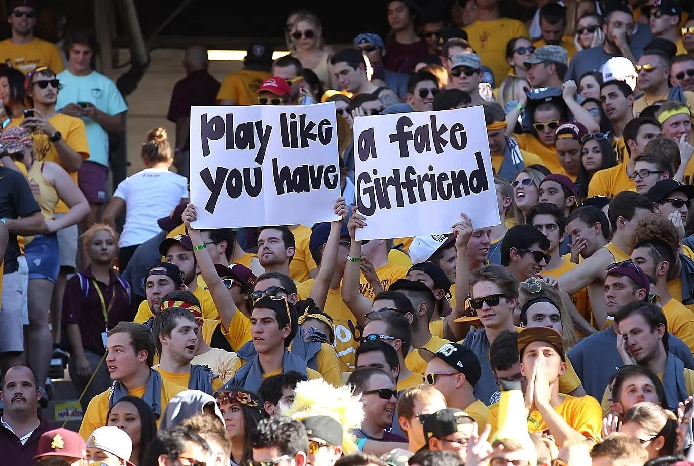 A very cleaver sign by the Sun Devil fans. Arizona State is known for being one of the best party schools in America. For the first time in a long time they also have one of the best college football teams in America. (Bruce Yeung/SI)