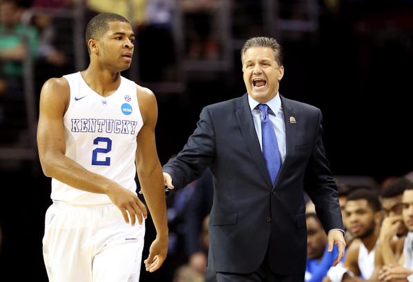 John Calipari told his team to be the aggressors in order to beat the press and that's what they did. In the first half. the Harrison Twins combined for 20 points in the first half, 2 more points than the entire West Virginia team. (AP Photo)