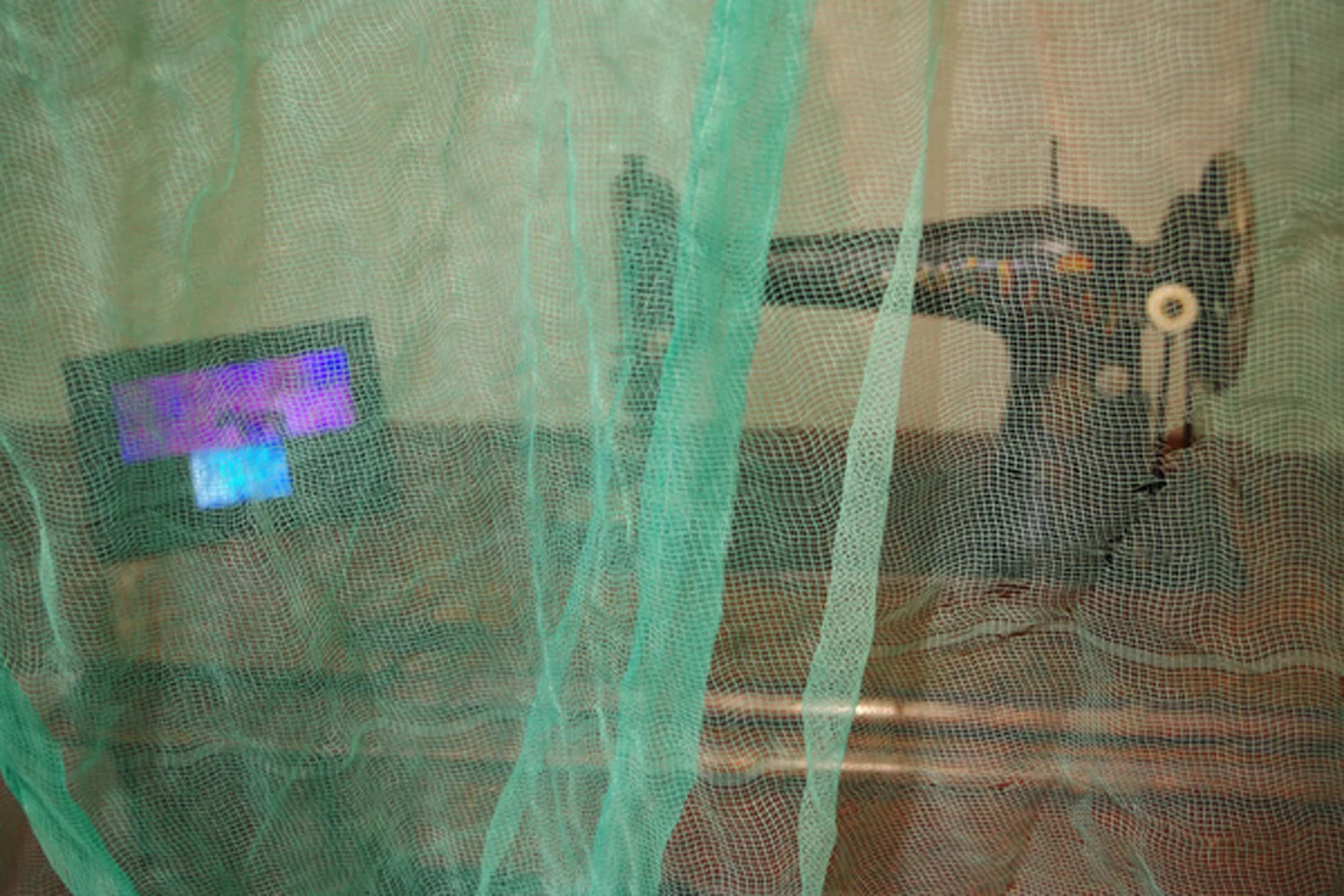  1. 'Dreaming Backwards', Nalda Searles, 1922 Singer Sewing Machine, box netting 1972, photographic monitor and images 1972-1985, NFS  