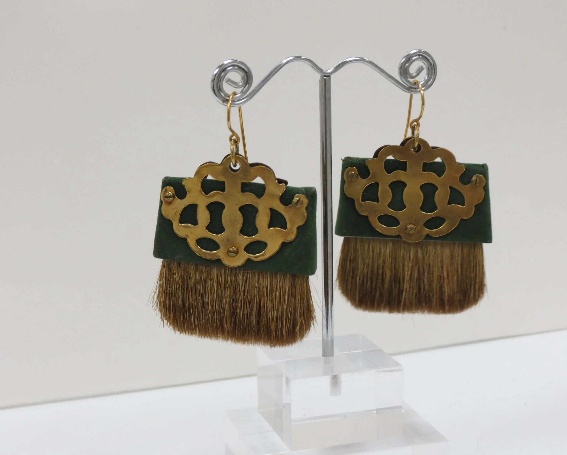  17. Kathy Aspinall, 'St. Patrick', 2018, brushes, flocked paper, brass, earrings, $175 