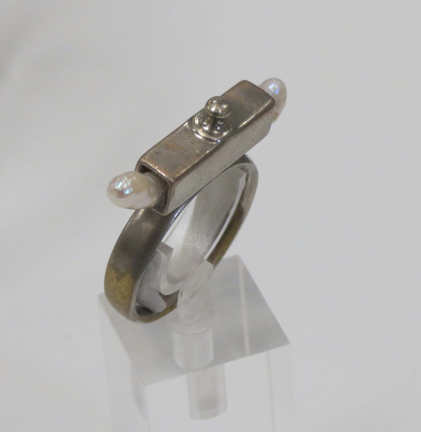  24. Kathy Aspinall, 'Pearl', 2017, steel, freshwater pearl, ring (size T), $120 