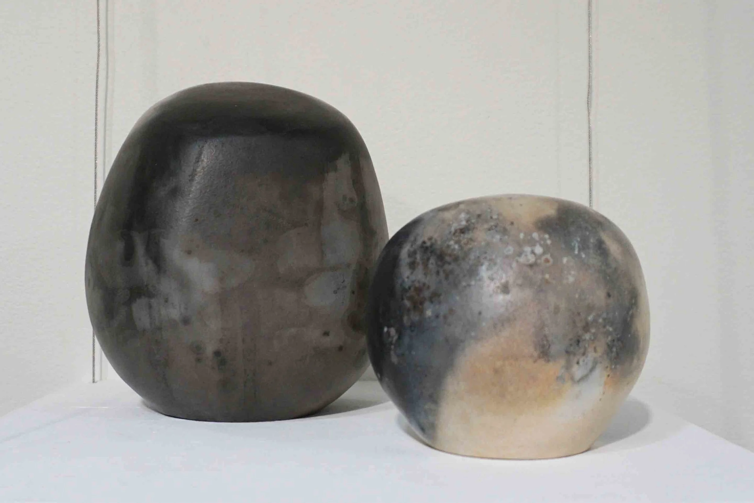  16-17. Narayani Palmer,  From the Ashes I &amp; II , 2017, white raku, white stoneware, pit fired $95-$150 