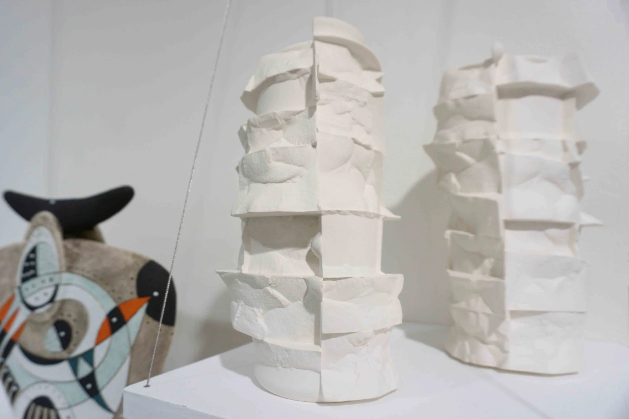  62. Annemieke Mulders,  In Between I &amp; II,  2018, porcelain and glaze. $195 each. 