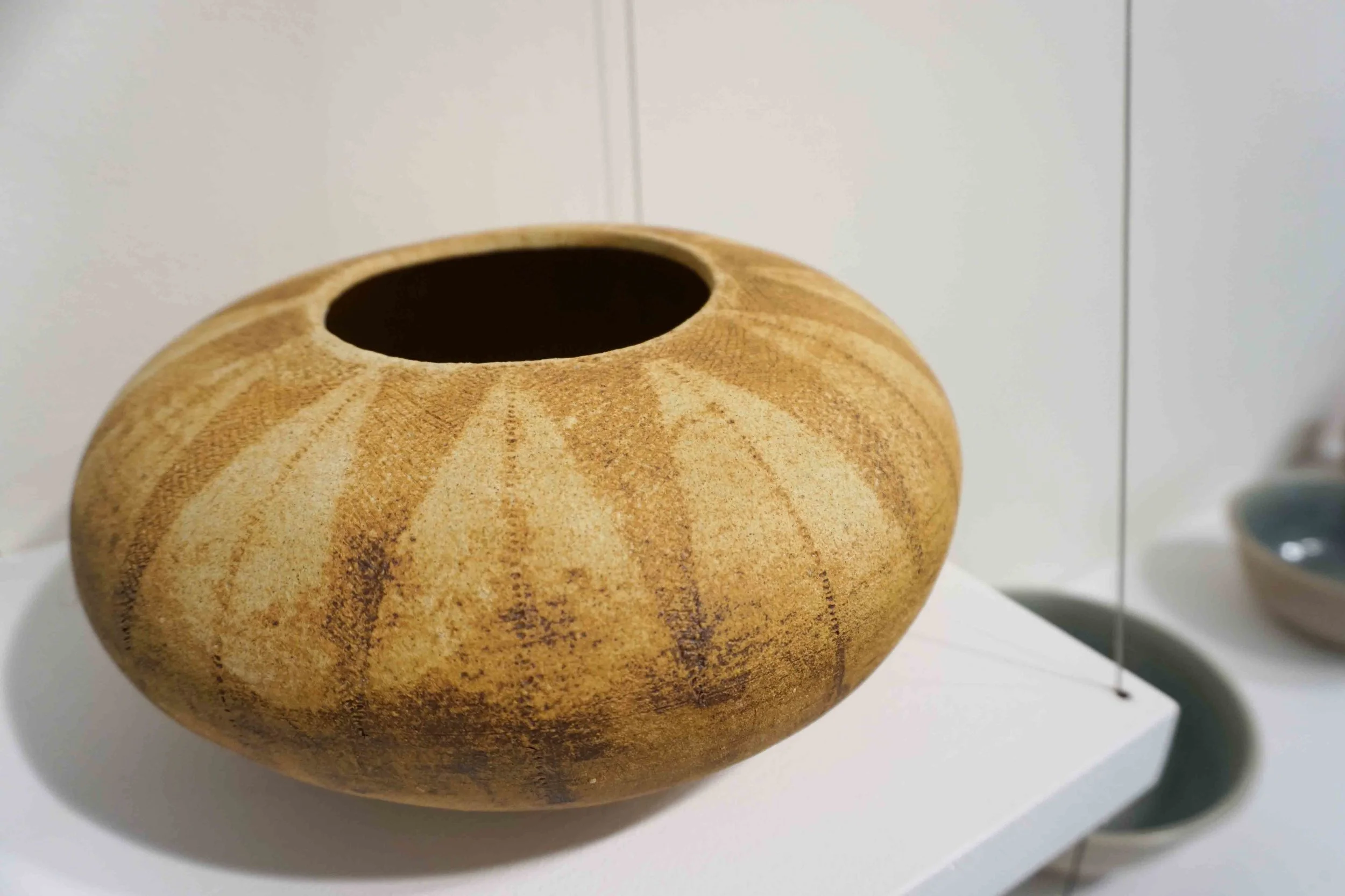  68. Sylvie Riches,  Bouteille Rouillé e, 2018, hand-built stoneware, iron oxide, kaolin, ash. $180 