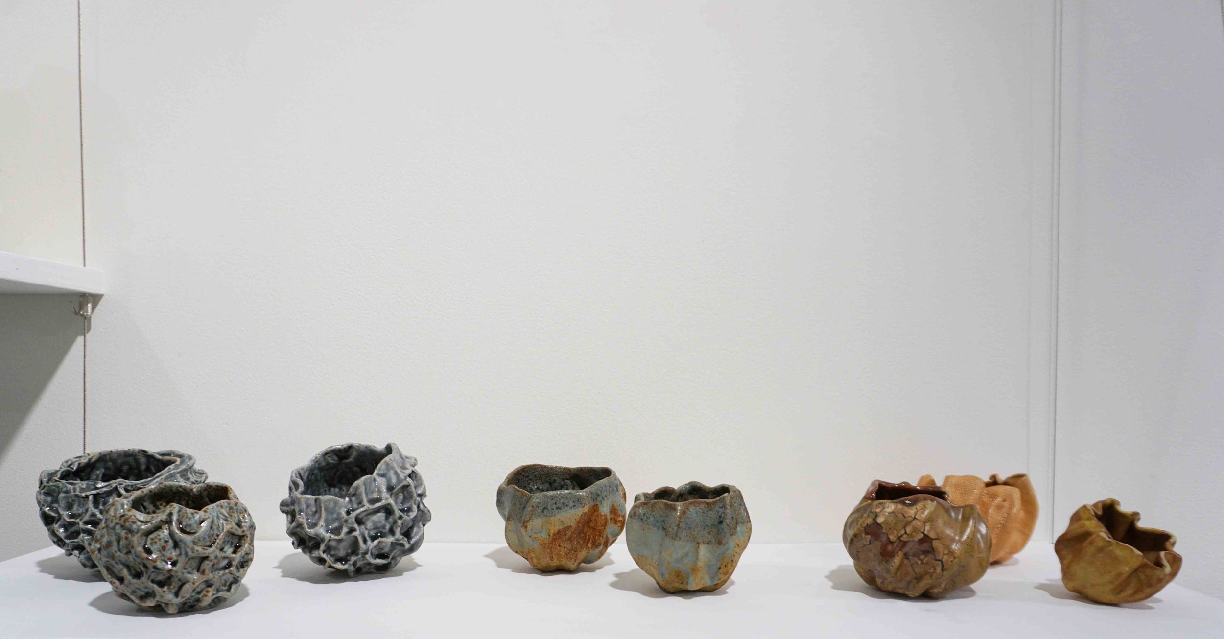  59-61. Jenny Kerr,  Pinched Landscape series , 2018, clay with glaze. $30 each 