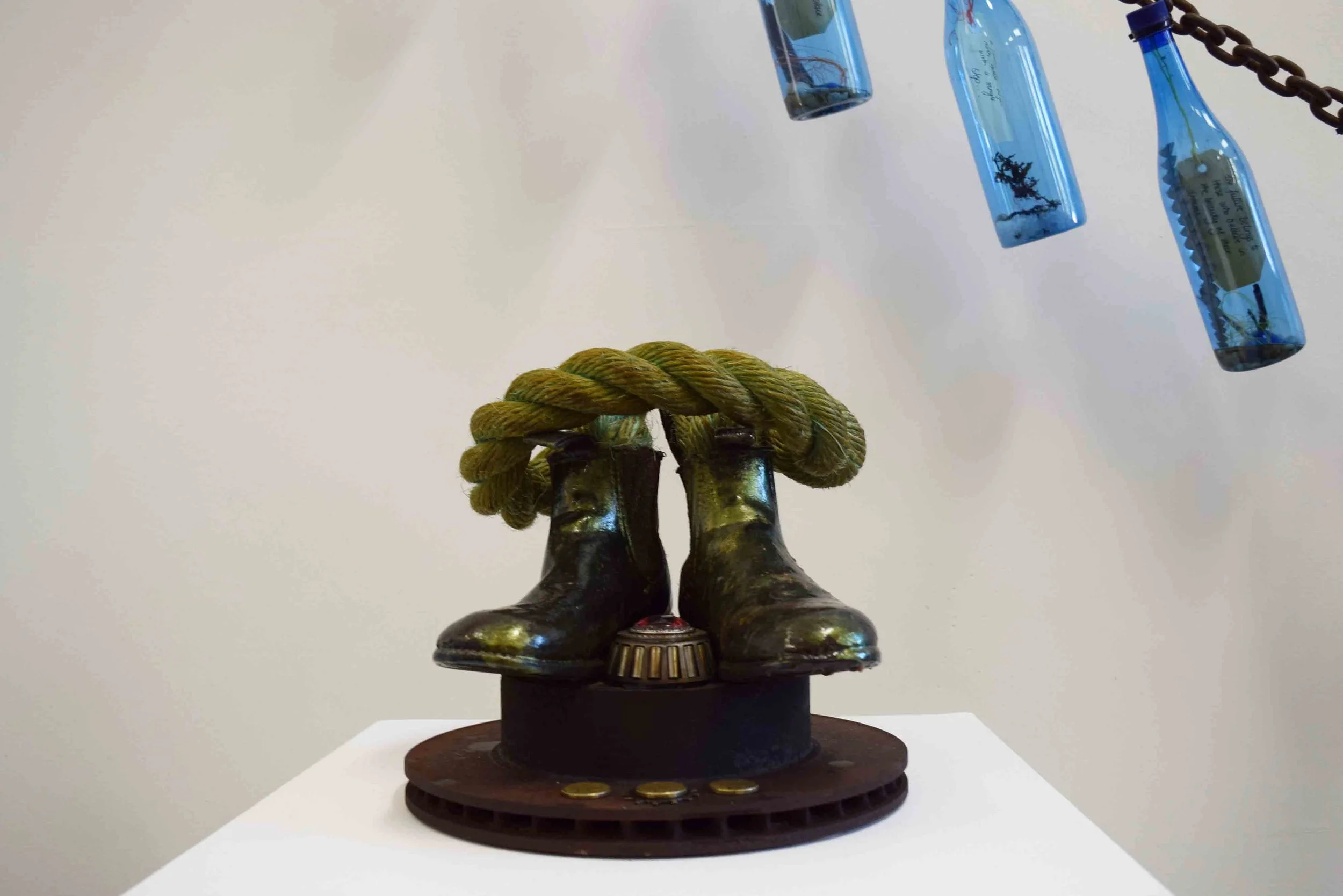  14.  Betty Steel SOS,  2018, found objects, mechanical parts, resin, 30 x 30 x 30 cm. $1,200 