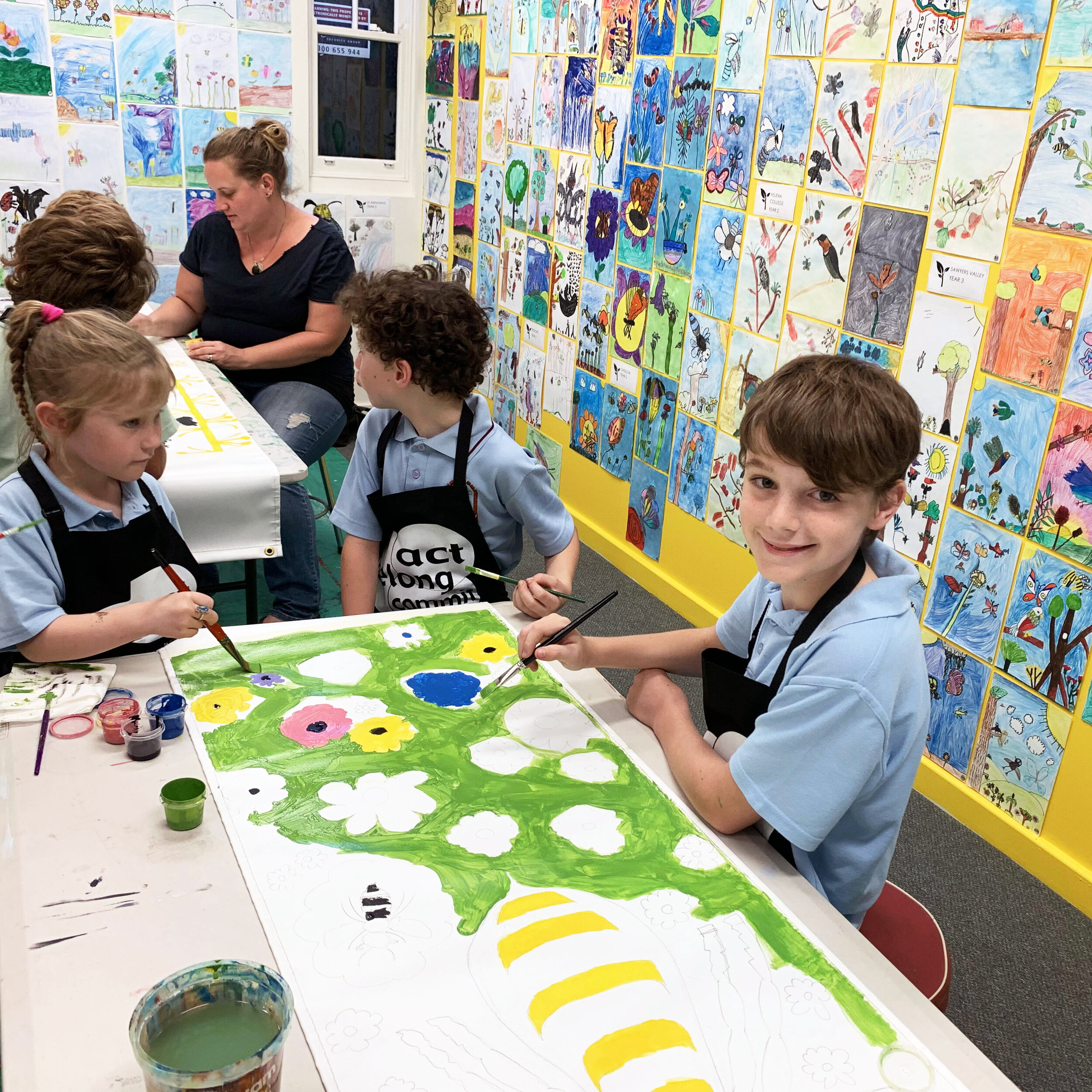 Lochlan painting his banner edit.jpg