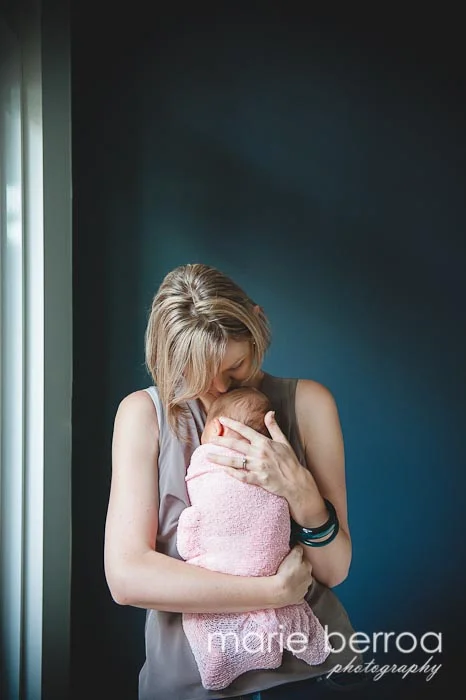 Beautiful cuddles. Gorgeous natural light and wall. 