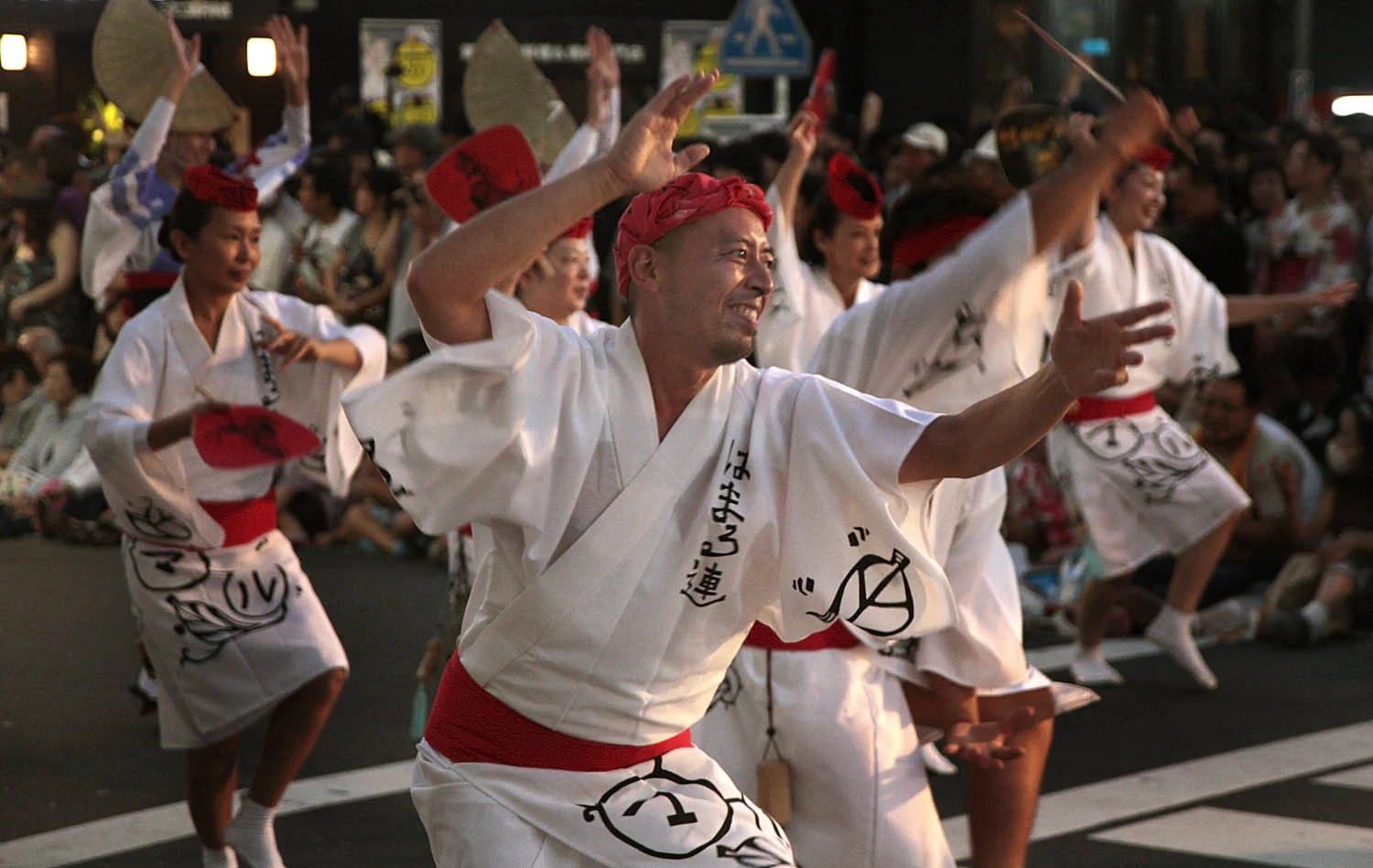 Dancers and musicians perform at the Awa Odori festival in Koenji in Tokyo. The dance festival is part of the summer Obon celebrations in Japan in which Japanese honor the spirits of their ancestors.