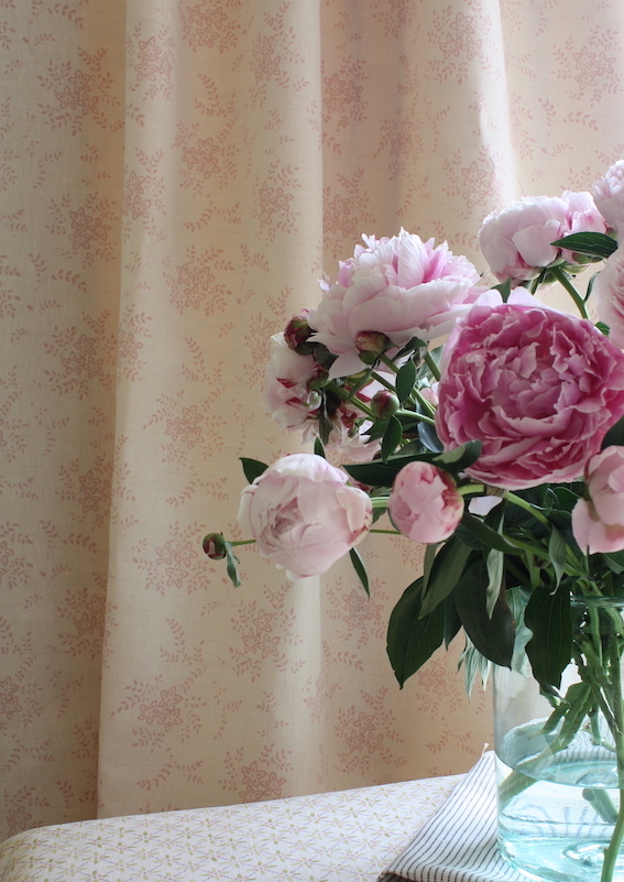 Sarah Hardaker Izzi Shell Pink curtain with fabric on the table in Zia Citrine and Dashi Indigo copy 4.jpg