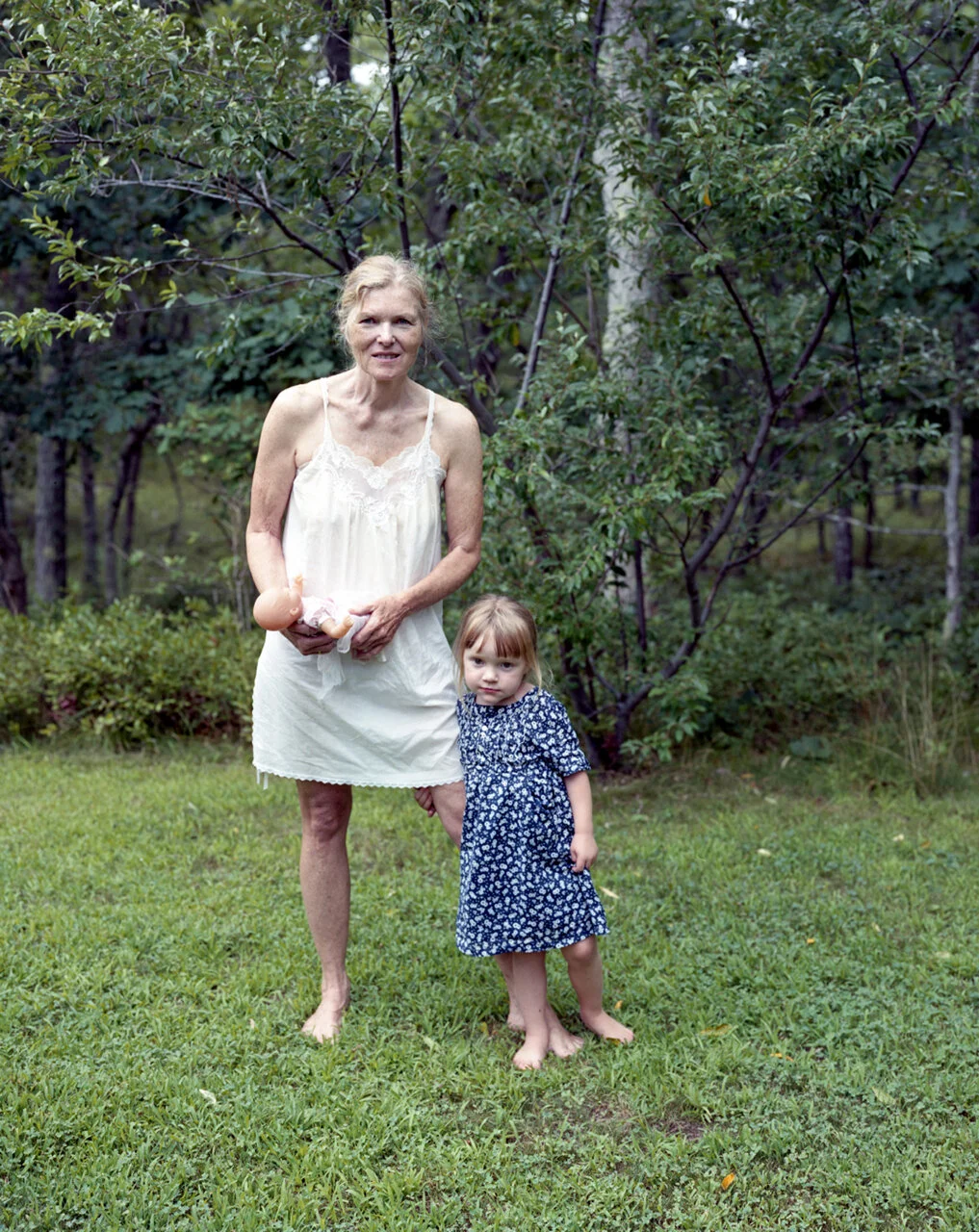 Kathe holding Nora's doll