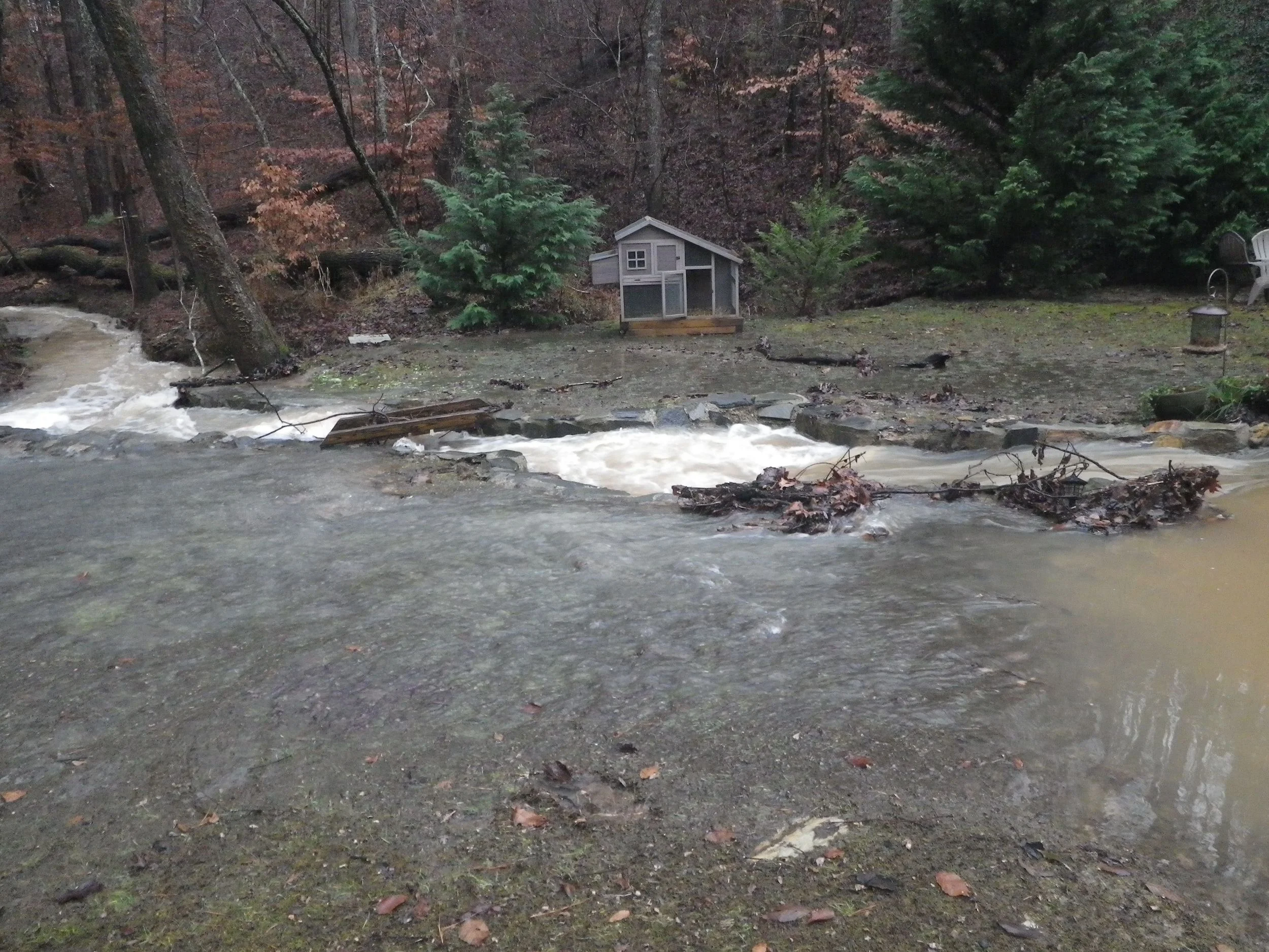 By mid-morning Sunday, the waters had receded somewhat. We were pretty spent after the clean up process. 