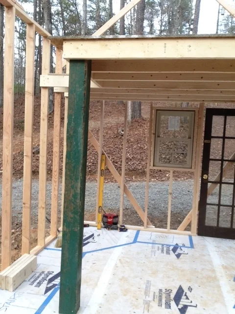 A slightly better pic. Note the previous taped areas. To the left is the stairway. The back corner is the bathroom, and the centered area will house a small sink.