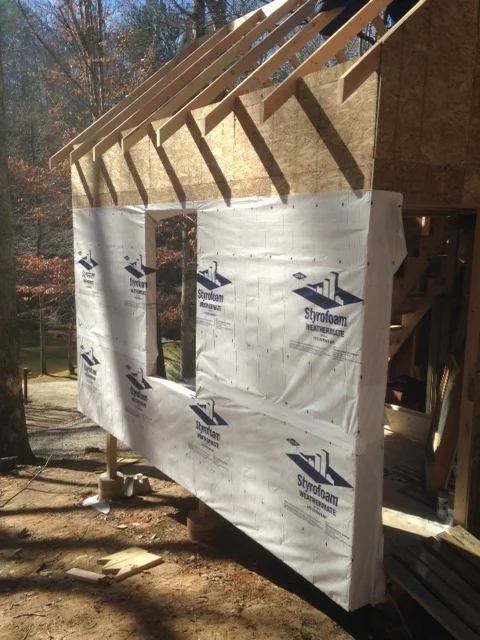 Starting to install the house wrap. Hope to finish it before the weekend, when it's supposed to rain.