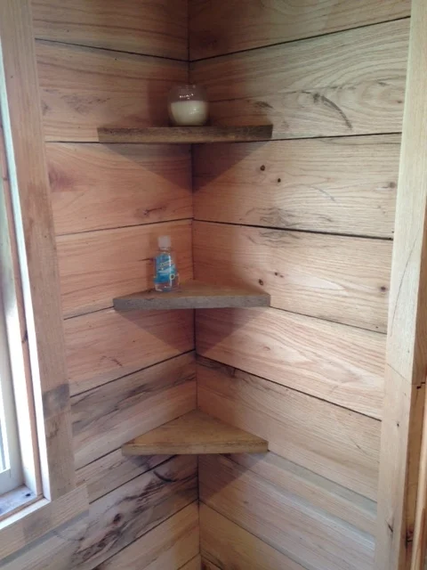 Put some simple shelves in the corner made from leftover scraps.