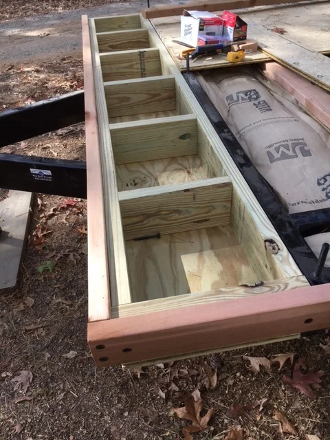 This is a 16" extension I built that is supported by the framing of the trailer tongue and is bolted to the main frame. It does not affect the turning radius much at all.