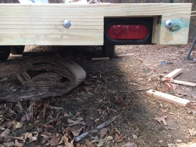 I cut around the lights on the back of the trailer so I wouldn't have to relocate them.