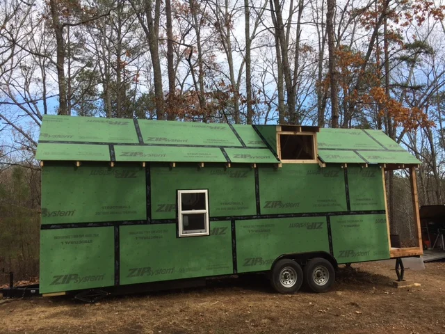 The roof is almost ready for the metal to be installed. Still need to finish out the dormer with sheathing, and install the window. 