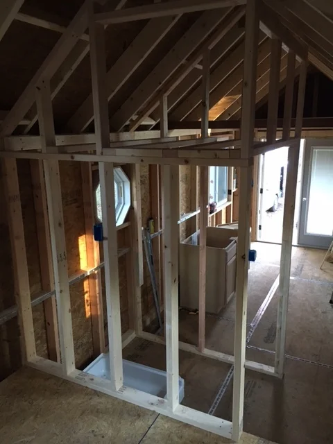 Started framing in the bathroom. There will be storage (accessible from the bedroom) above it.