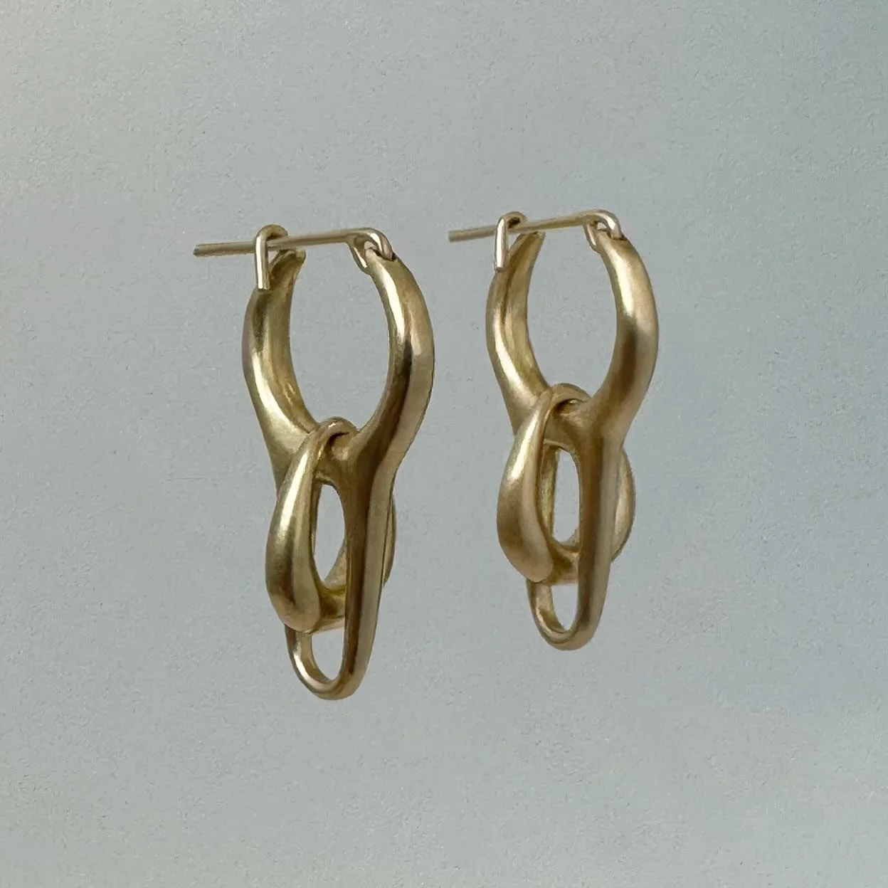 Custom Ploe earring in 18k gold
