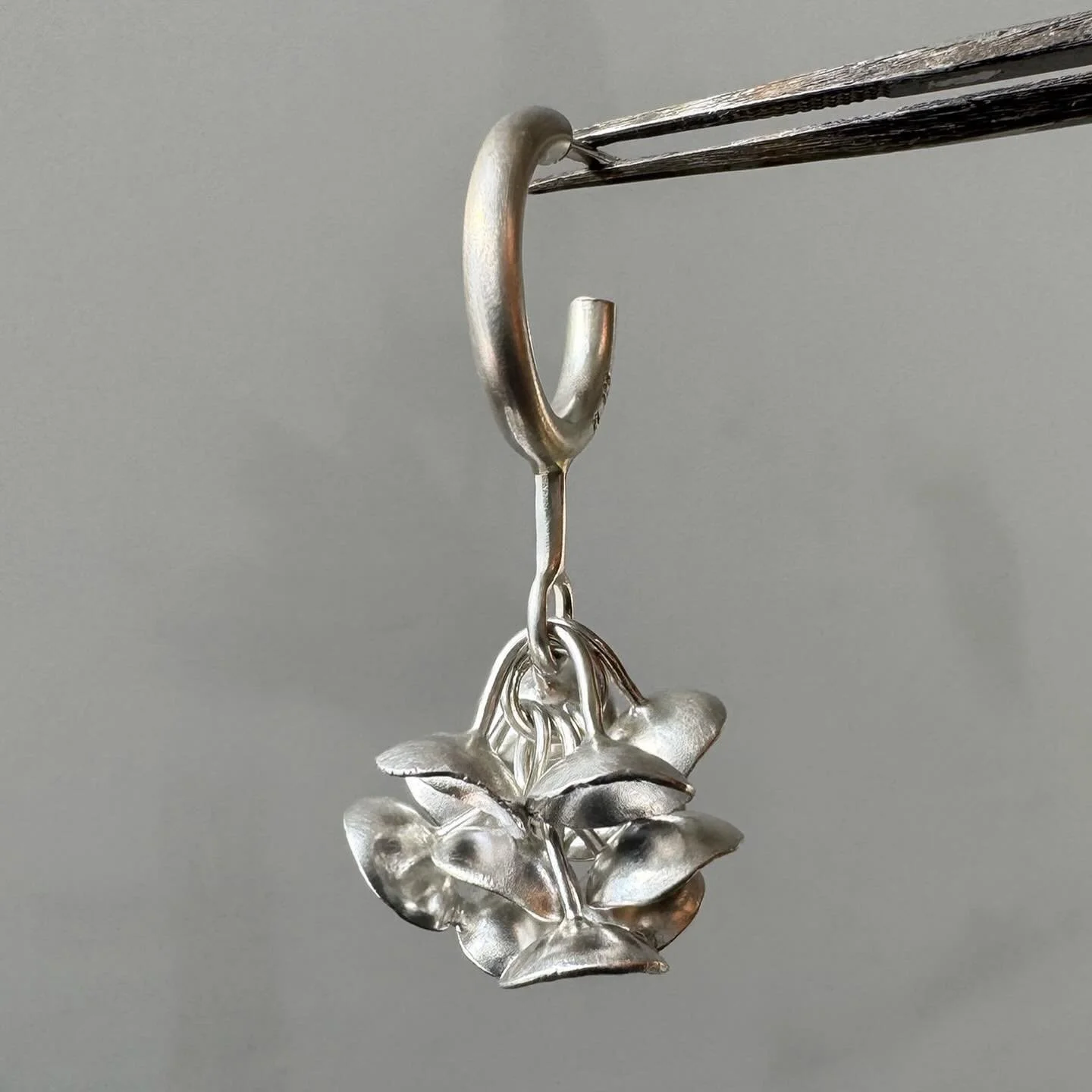 Valite Earrings

Designed in January in anticipation of Spring, these earrings are an homage florals soon to bloom.