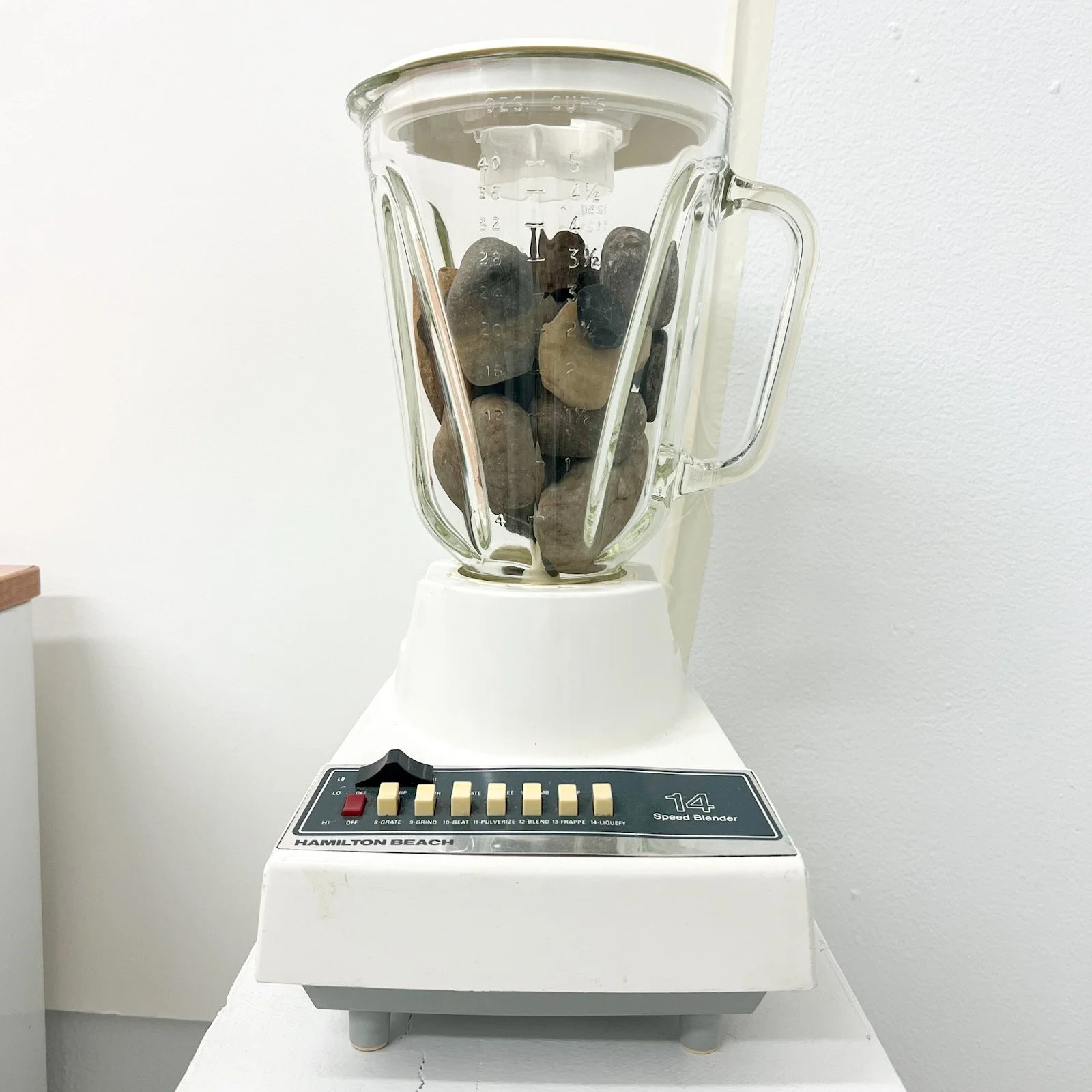  'Power', river rocks and glass blender, 2024 