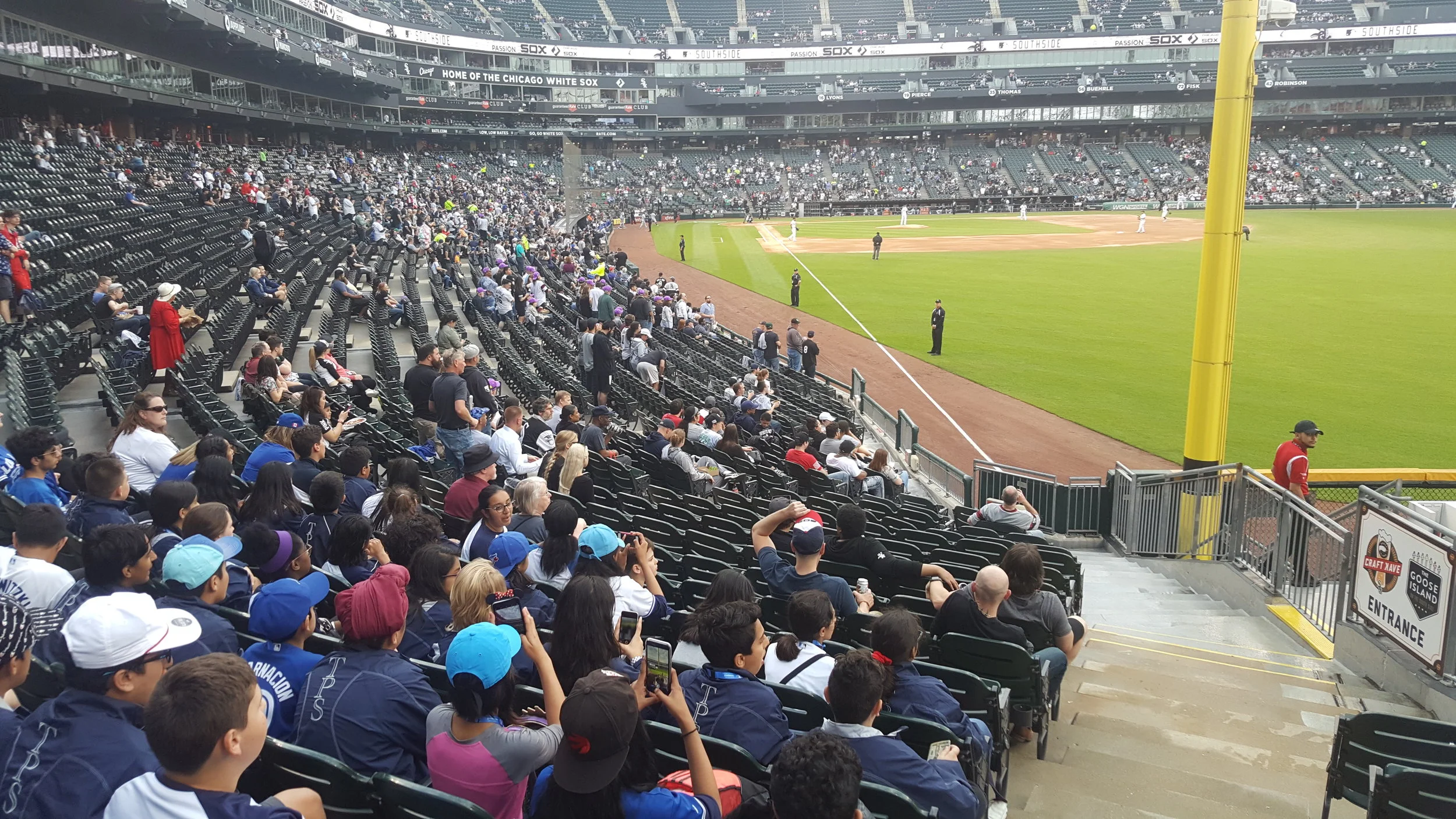 For anyone watching at home, we're on the first base line directly behind the foul pole. 