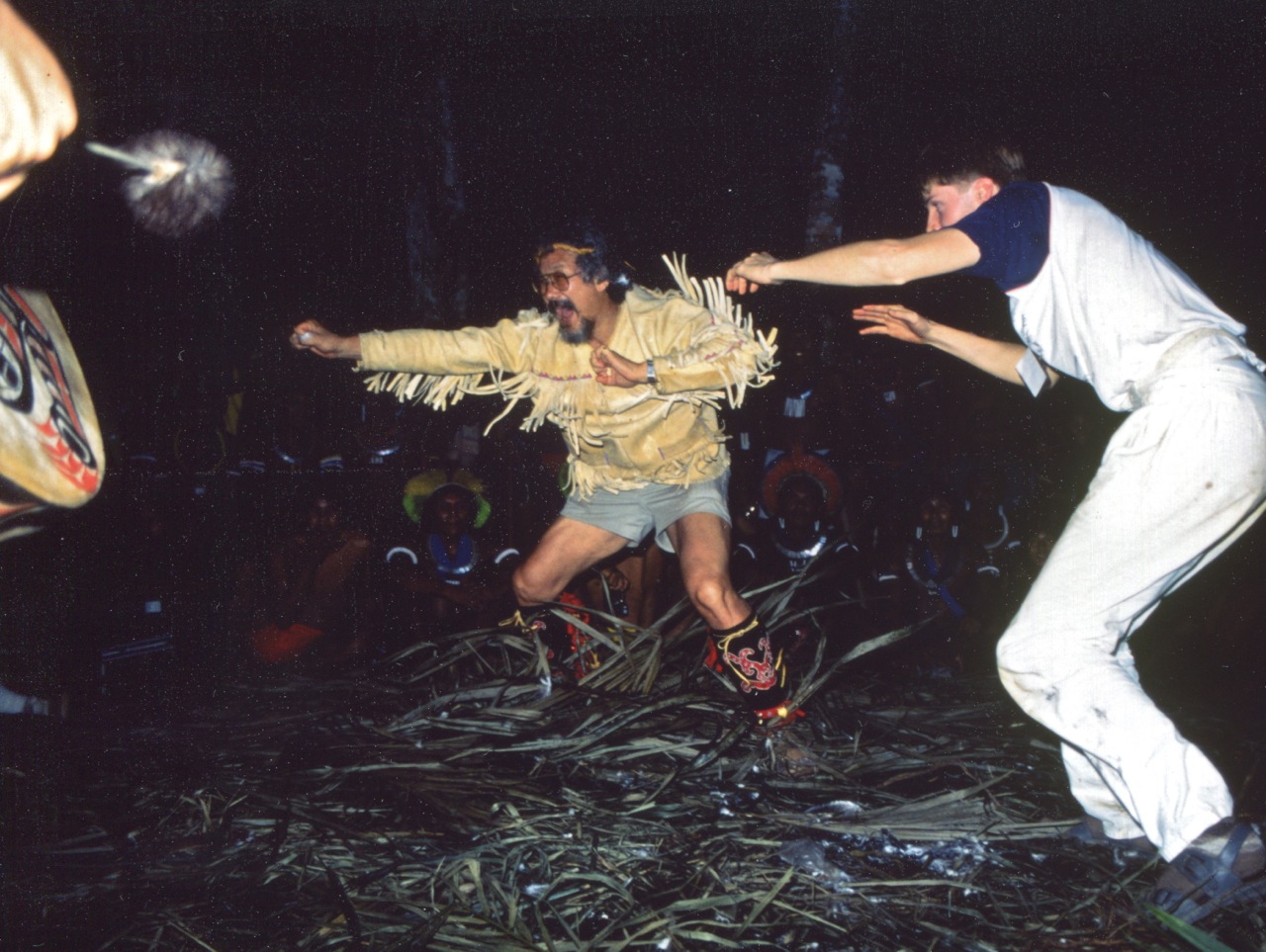 Jeffrey and esteemed scientist-broadcaster David Suzuki perform a Haida men's dance in the Amazon rainforest for an audience of Kayapo indigenous people.