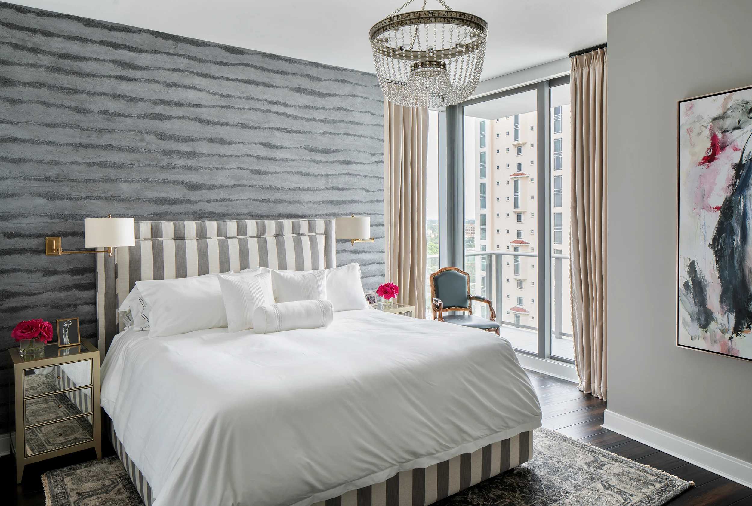 MONOCHROMATIC BEDROOM WITH LARGE ABSTRACT