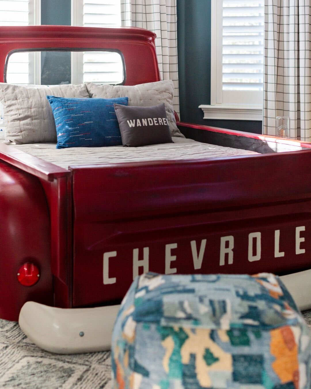 It's safe to say that this vintage pick-up truck bed frame stole the show in our junior car lover's bedroom ❤️ With a show stopping piece liek this, we kept the rest of the room finished in a palette of cool blues and fresh whites to keep the focus o