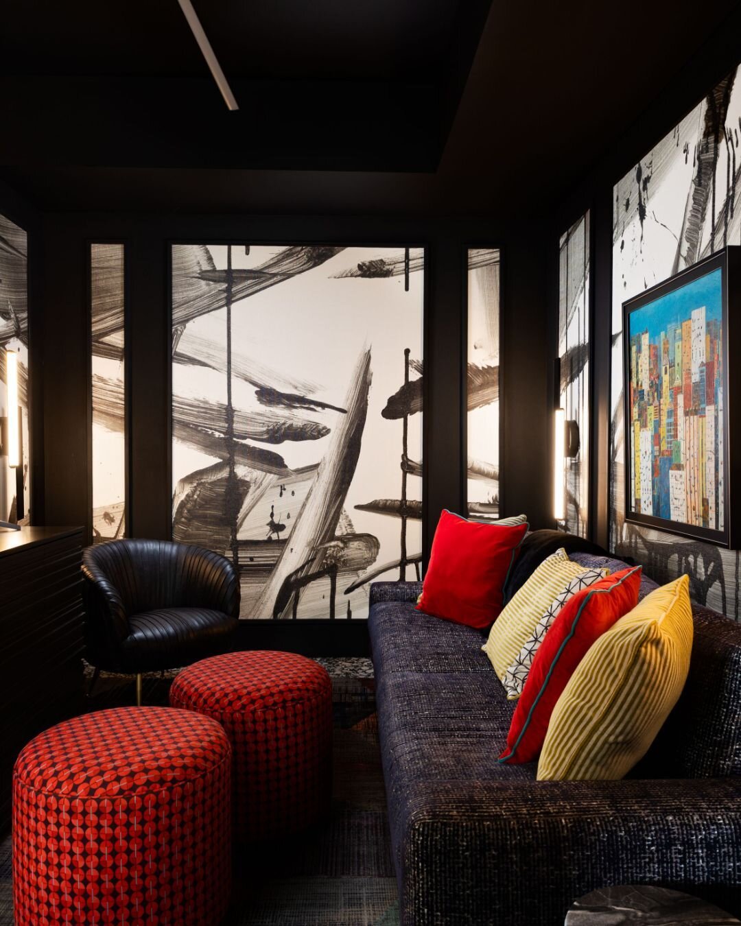 A color blocked painters palette brought every corner of this moody den to life 🖤  It was made complete with custom ottomans designed by our team and built locally!

📸 :: @nativehousephotography