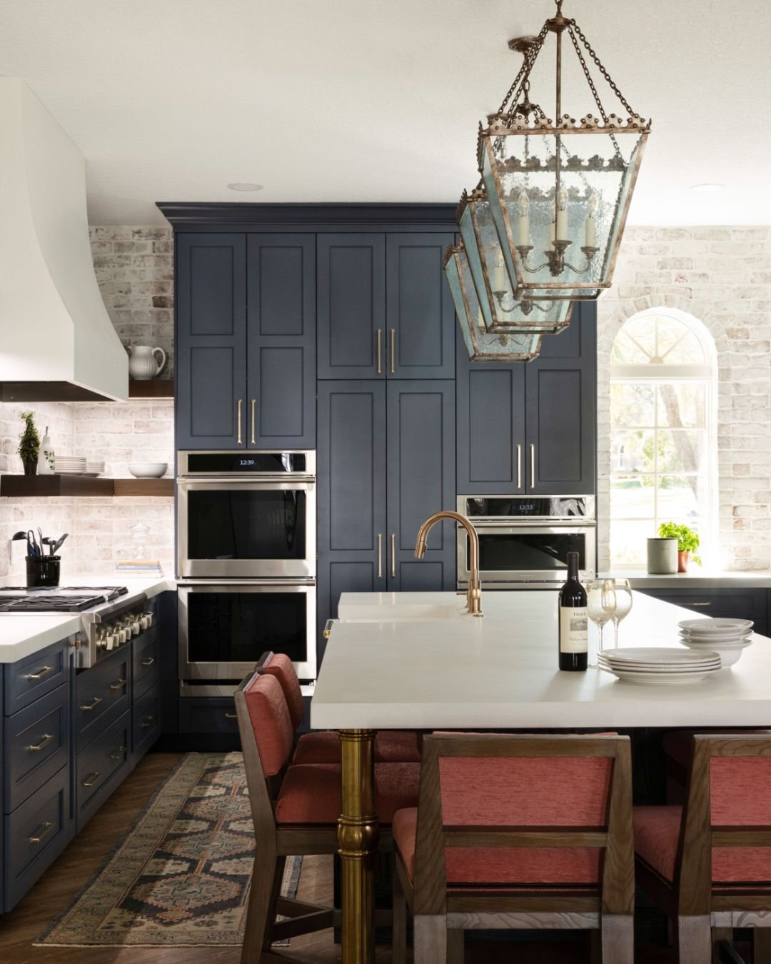 Aside from the effortlessly cool hues and understated textures, my favorite hidden feature that we built into this custom kitchen is the secret walk-in pantry--you're looking right at it! 💙 

This kitchen was formerly crammed into an awkward shape, 