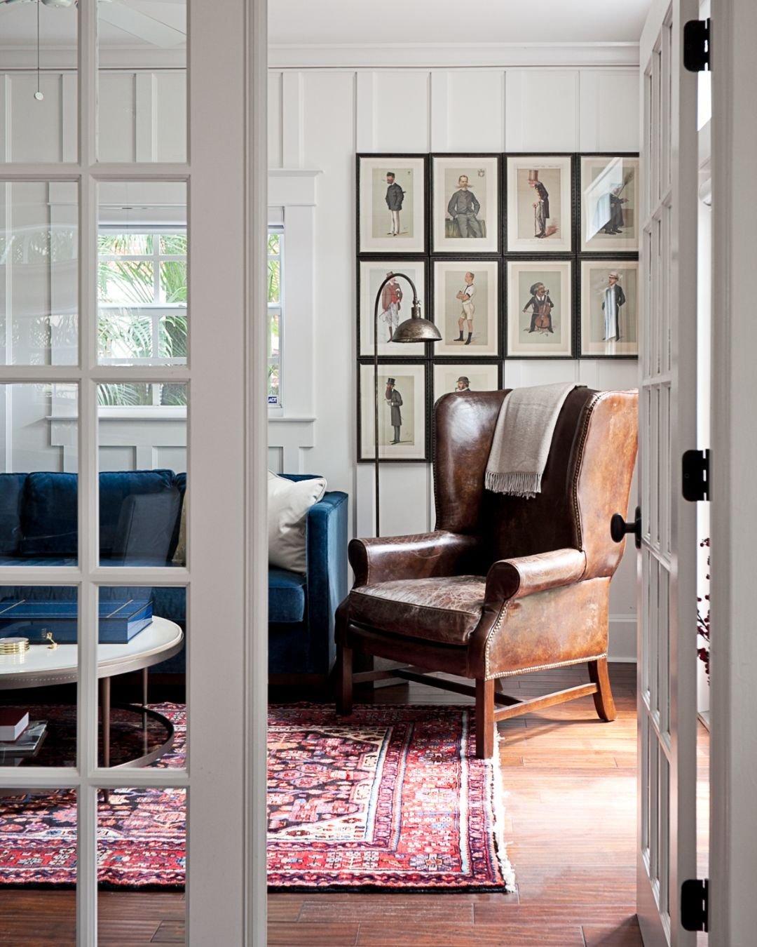 This 1920's historic home had a unique charm of it's own-- it was so easy and fun to bring out it's true character even more with classic furnishings and heirloom pieces!

This was one of my favorite rooms, with a cozy blue velvet sofa and a neatly o