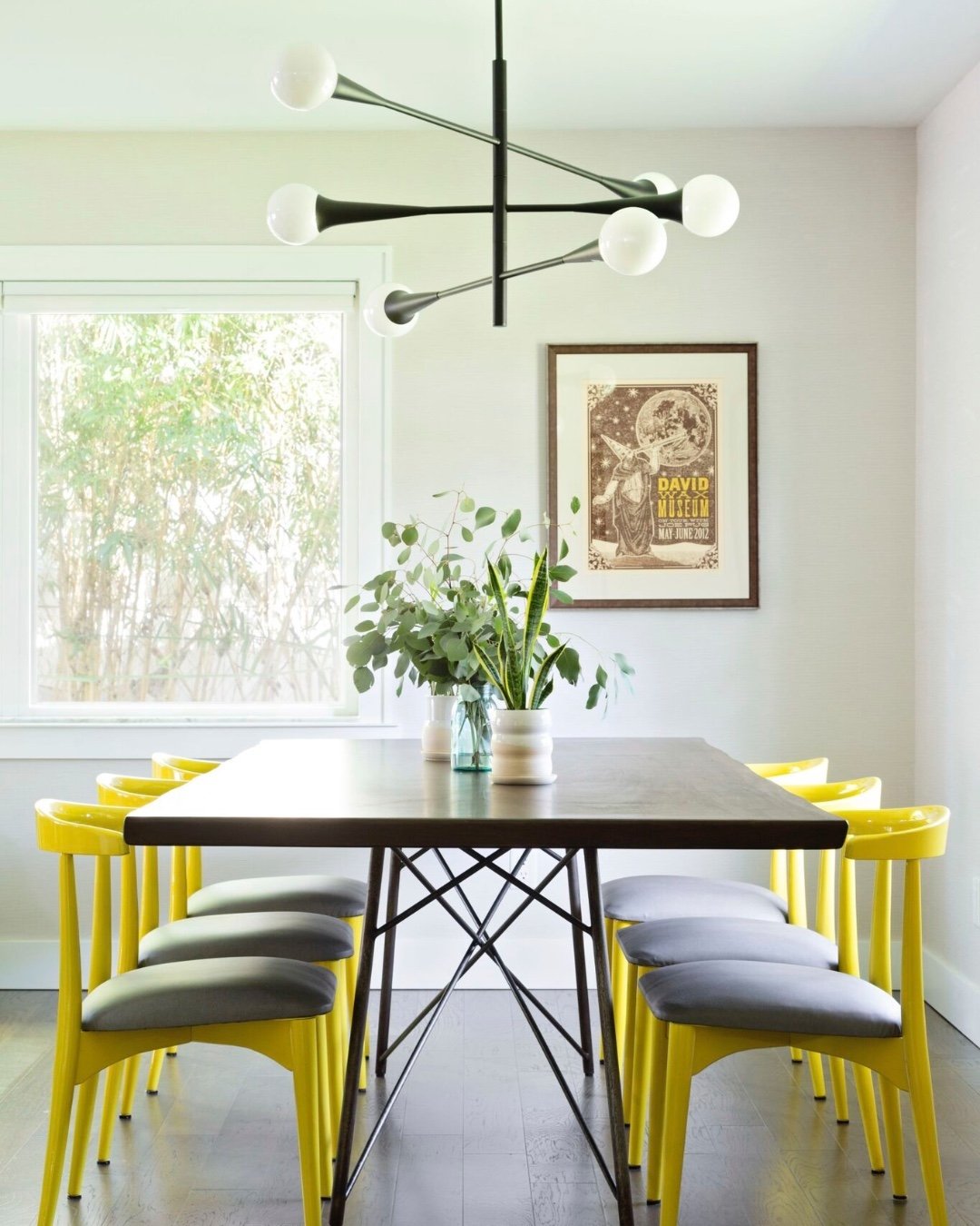 What better color to crush on this summer than yellow! 💛 

Yellow is bold, bright, beautiful, playful and warm; who wouldn't want to throw some yellow into their space?

This dining room surely can't help but make you feel happy. Using yellow on a m